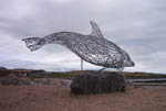 Stonehaven sculpture of Dolphin. Picture from Fishing Arts website
